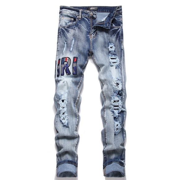 AMIRI Light Blue Distressed Skinny Jeans - Picture 1 of 7